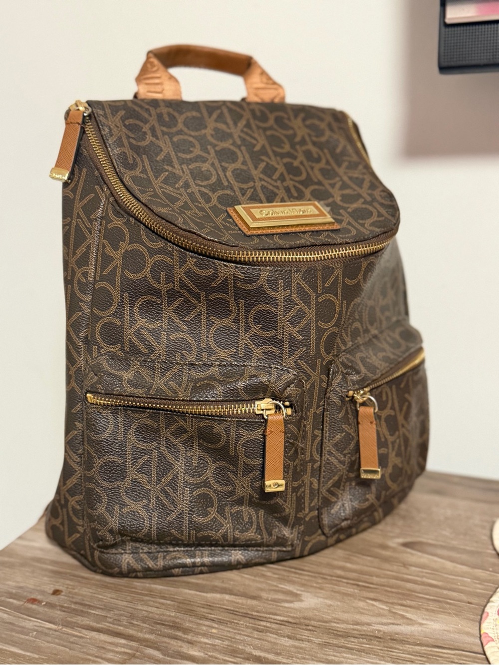 Calvin Klein Brown Monogram Backpack with Tan Trim